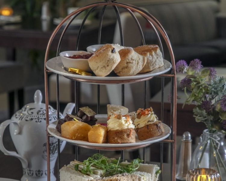 Afternoon tea cakes and sandwiches