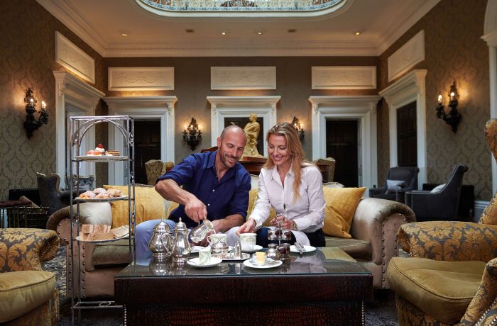 couple having afternoon tea at oulton hall hotel in yorkshire
