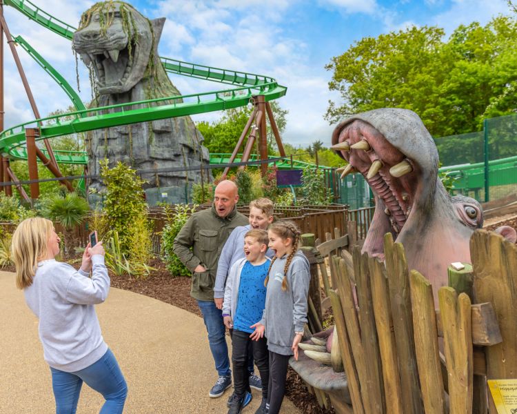 family taking photos at Chessington world of adventures