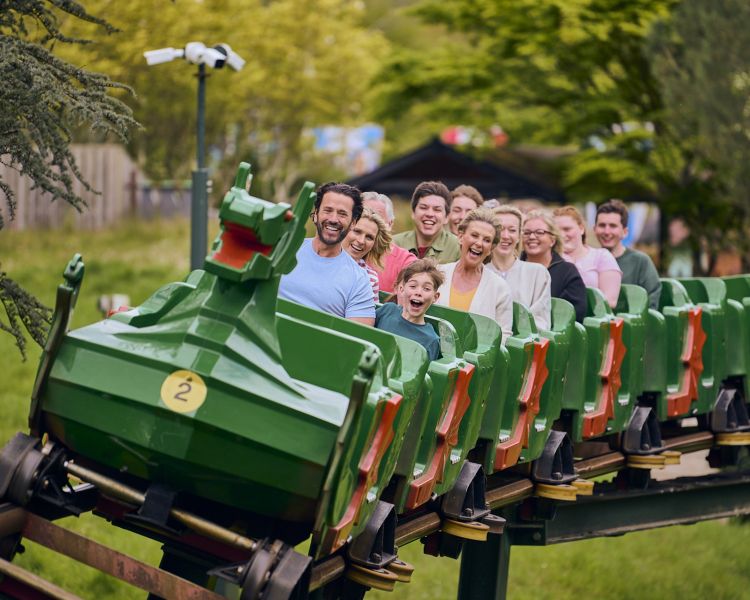 people on rollercoaster ride at legoland