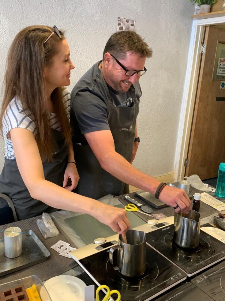 Couple at candle making workshop