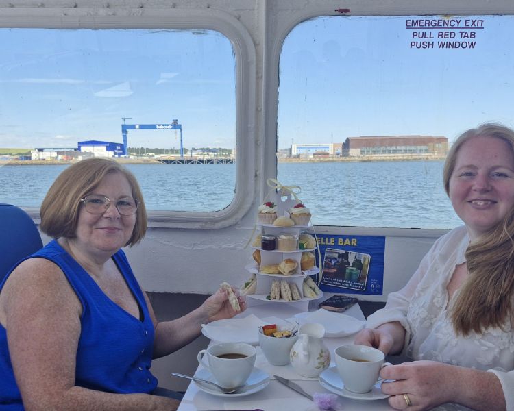 two ladies enjoying the blackness castle cruise