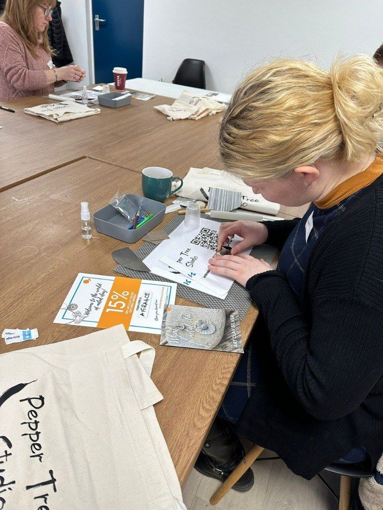 Girl working at silver clay workshop