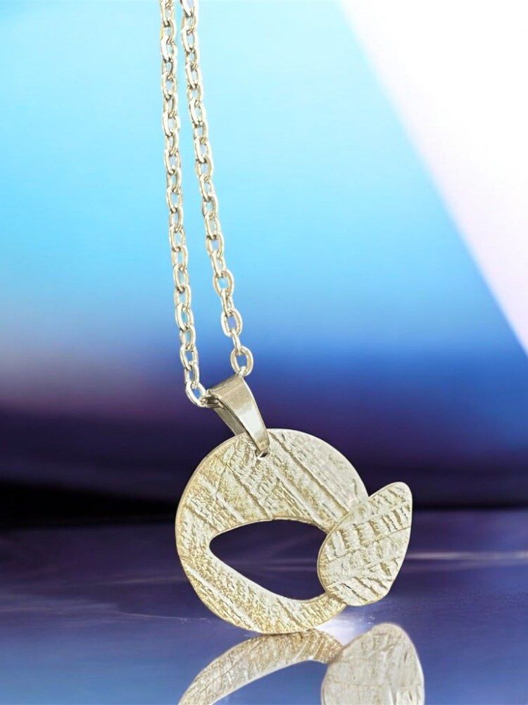 Cut out necklace made from silver clay