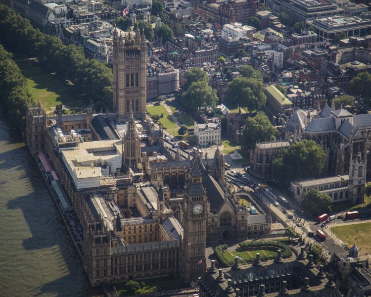 aerial view of the houses of parliament seen from a helicopter ride