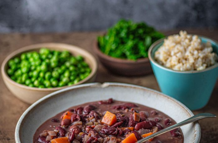 healthy meal with bowls of cooked vegetables on a table