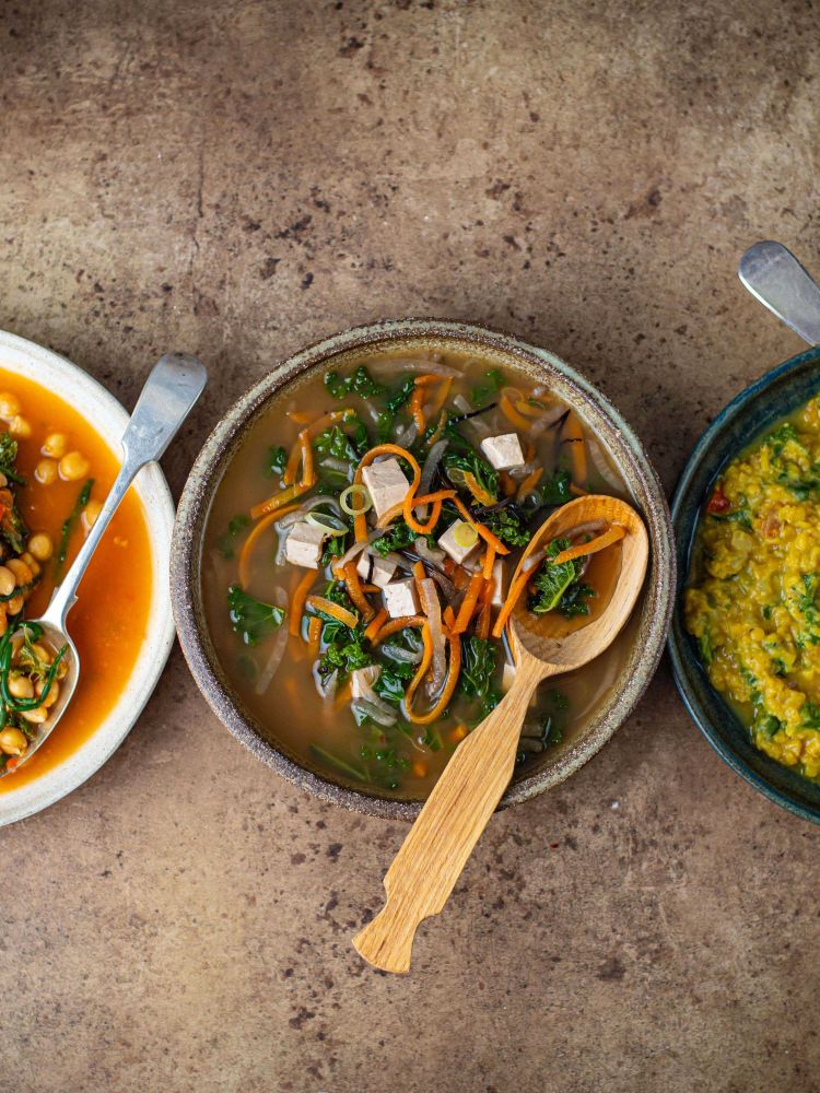 a trio of healthy meals on a table