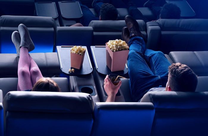 couple sitting in luxe seats at an odeon cinema