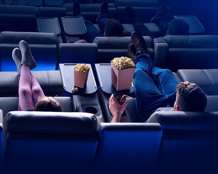 couple sitting in luxe seats at an odeon cinema