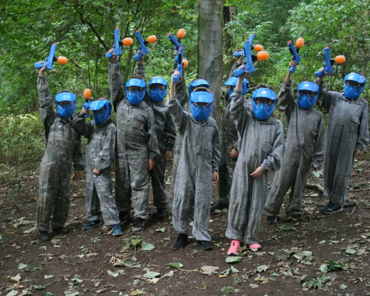 group holding their guns up on a gel ball experience