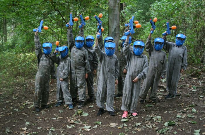 group holding their guns up on a gel ball experience