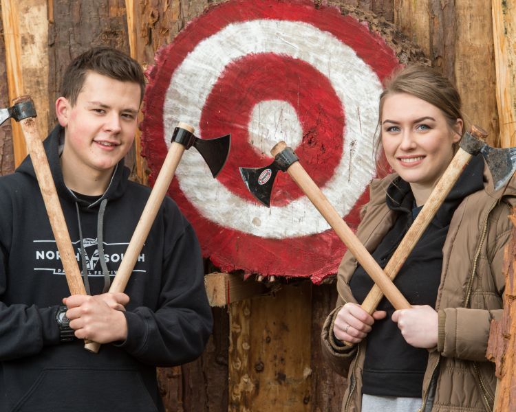 man and woman on an axe and knife throwing experience