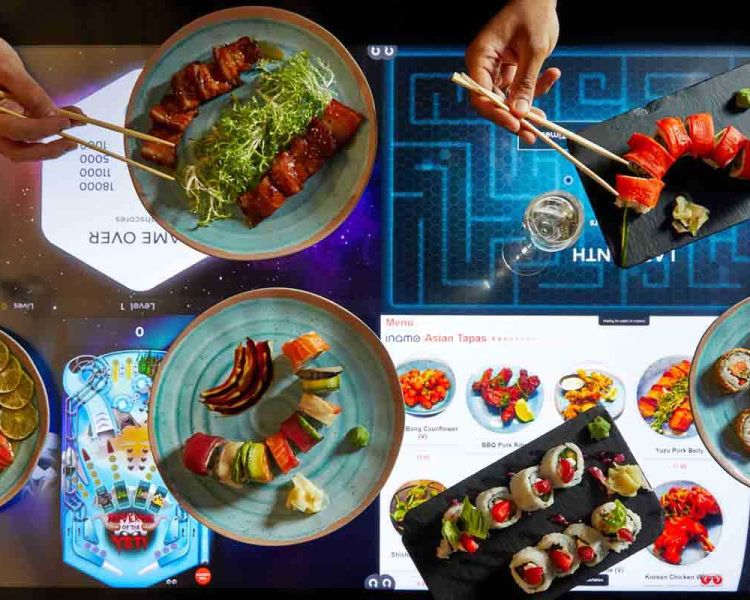 table at inamo showing the games and interactive menu