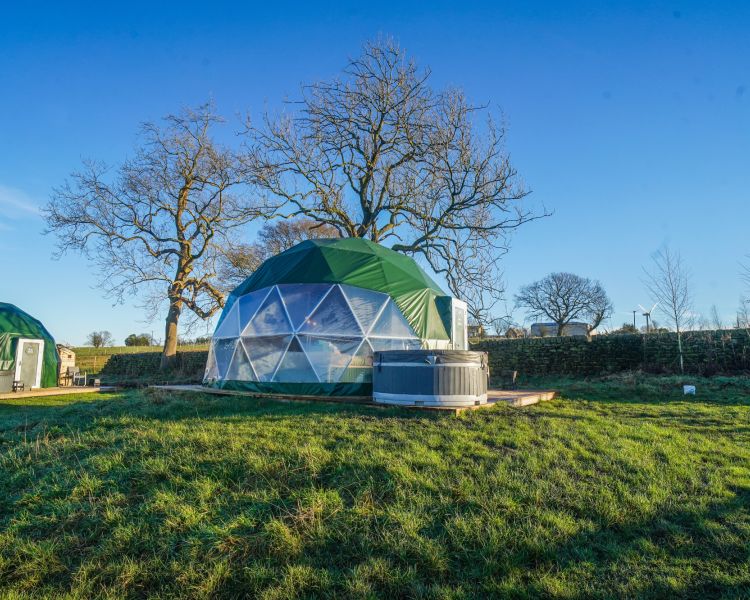 Geodomes hot tubs and surrounding fields