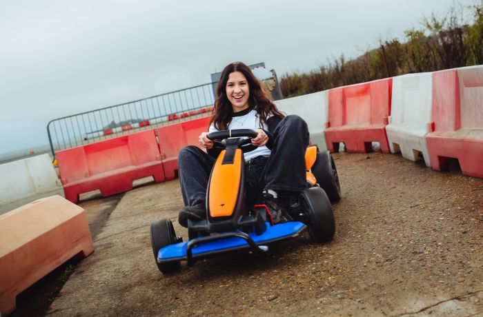 girl on go kart on a family driving day