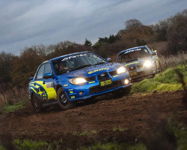 two subaru impreza's on a dirt track for a rally driving experience day