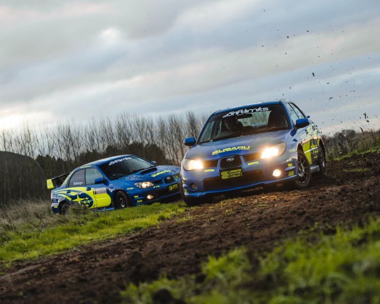 two subaru impreza's on a dirt track for a rally driving experience day