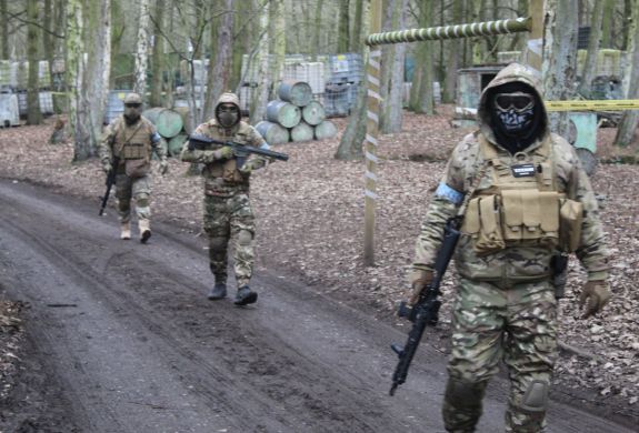 three men in combat gear on airsoft course near wolverhampton