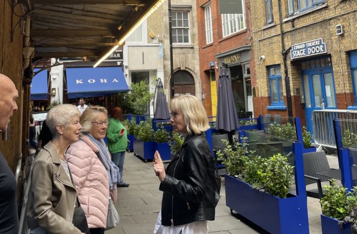 theatre tour group at st martins court listening to guide