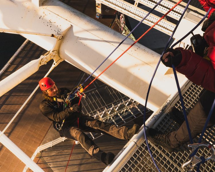 man abseiling down the principality stadium at zip world cardiff