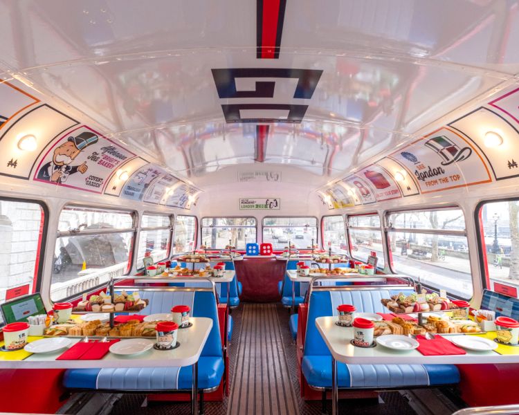 the interior of the monopoly afternoon tea tour bus