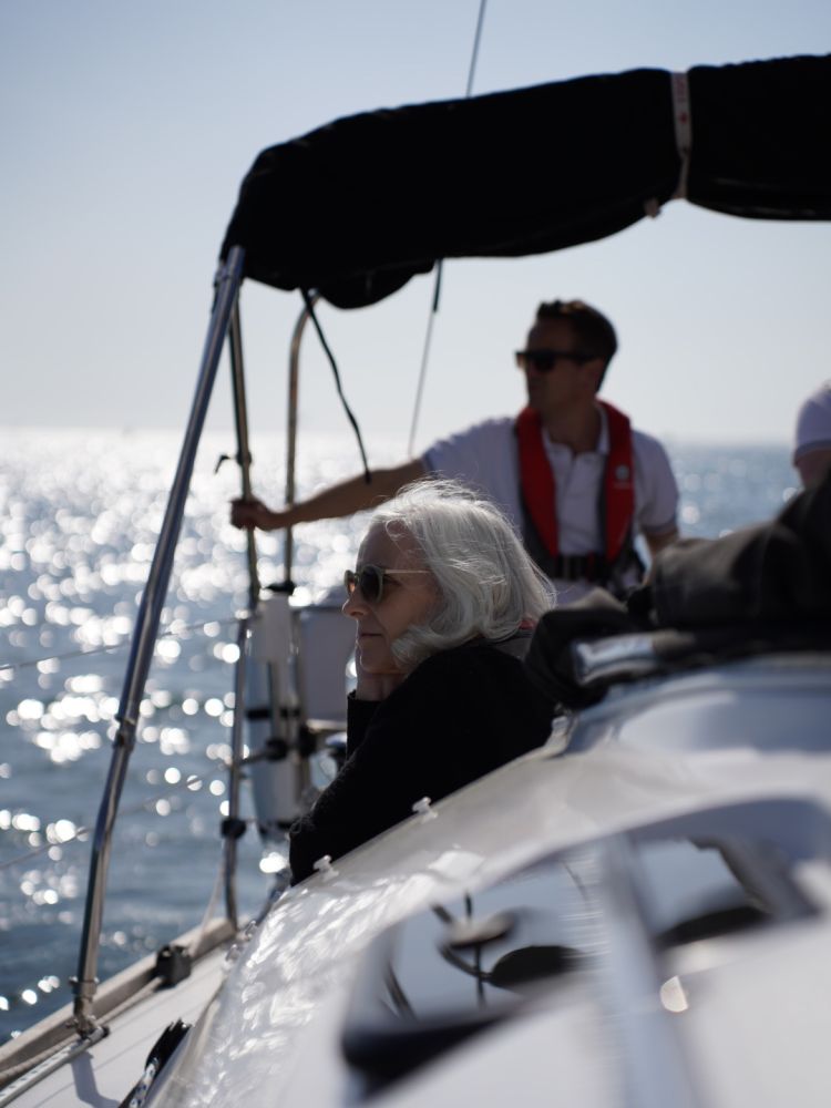 guests on yacht sailing on solent
