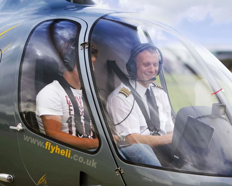 Student and instructor in cockpit of cabri helicopter