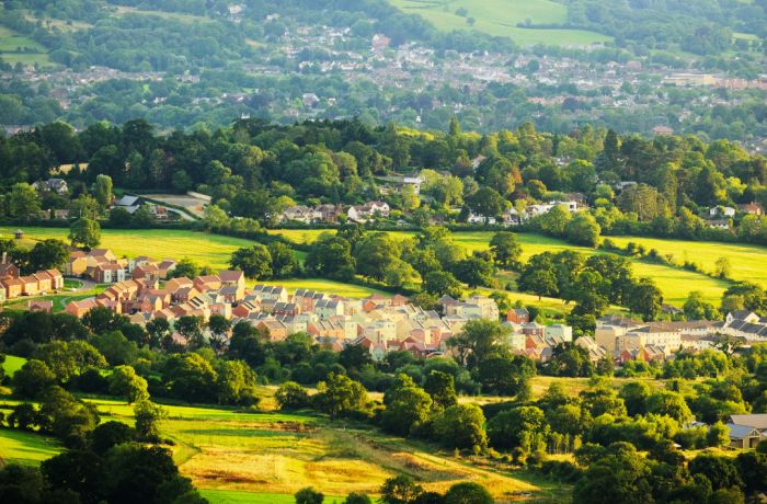 villages in the cotswolds seen from above on a helicopter ride