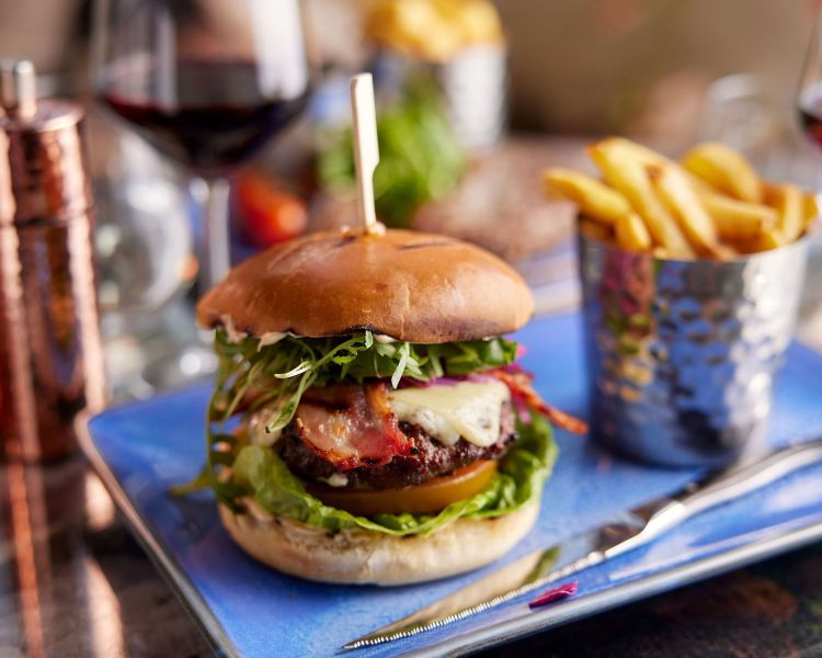 a burger and chips at the clermont charing cross hotel