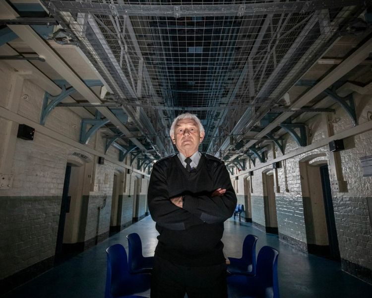 a prison guide for a ghost tour at a haunted prison experience day