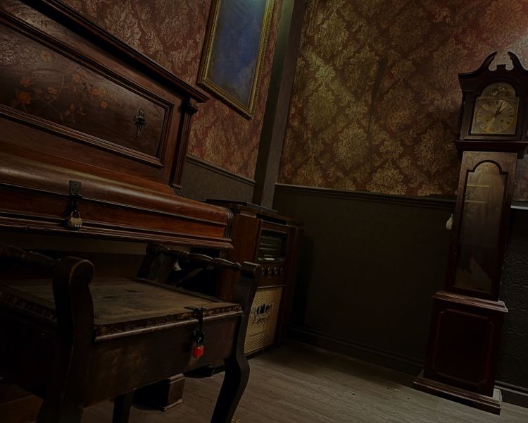 old room with piano and grandfather clock