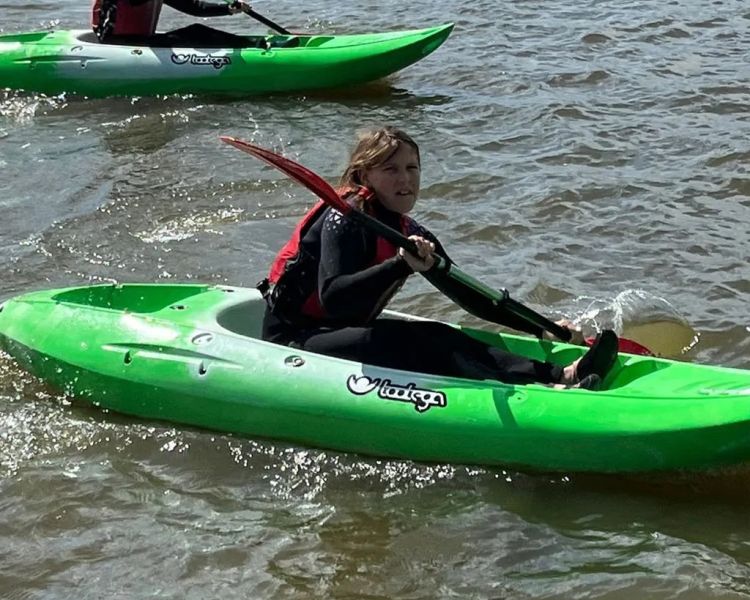 People canoeing at oulton broad water sports centre in suffolk