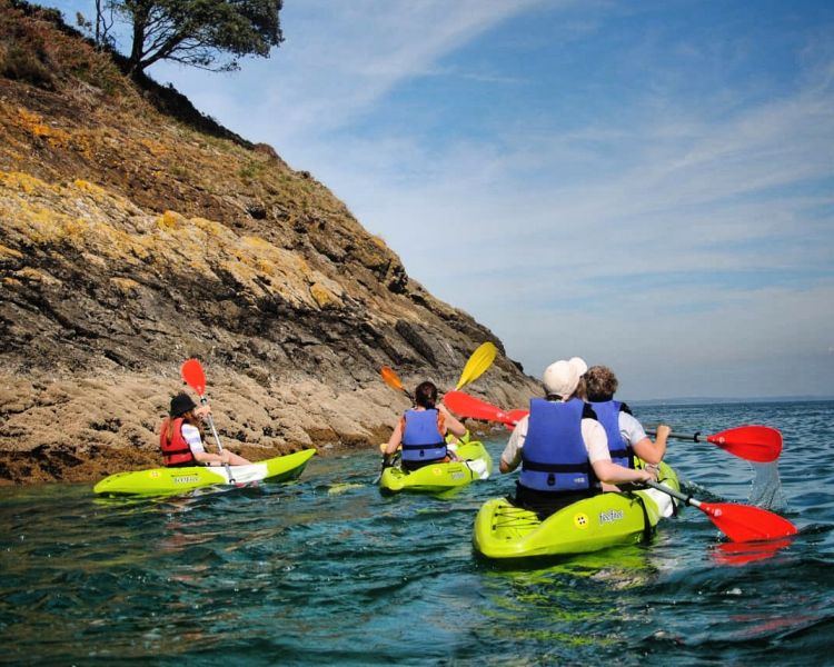 People kayaking along pembroskeshire coast