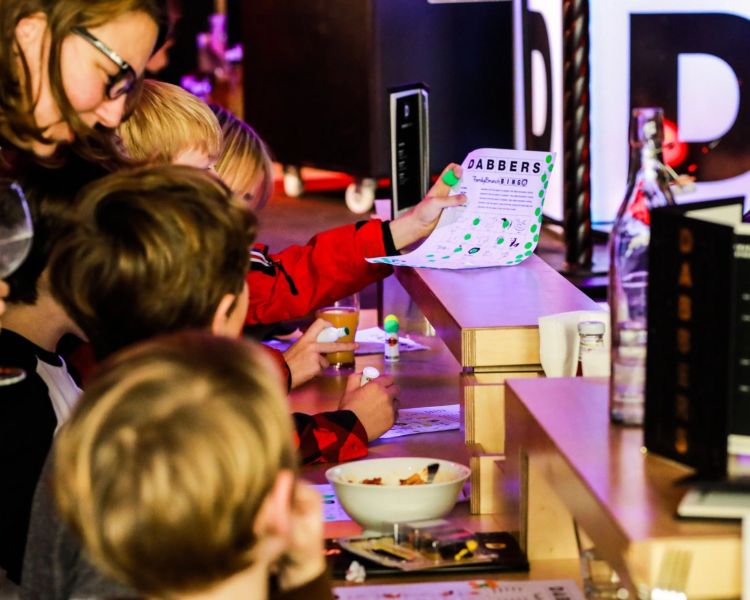 Kids playing bingo at family bingo event in london