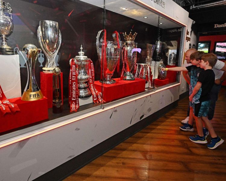 A family exploring the liverpool fc anfield museum