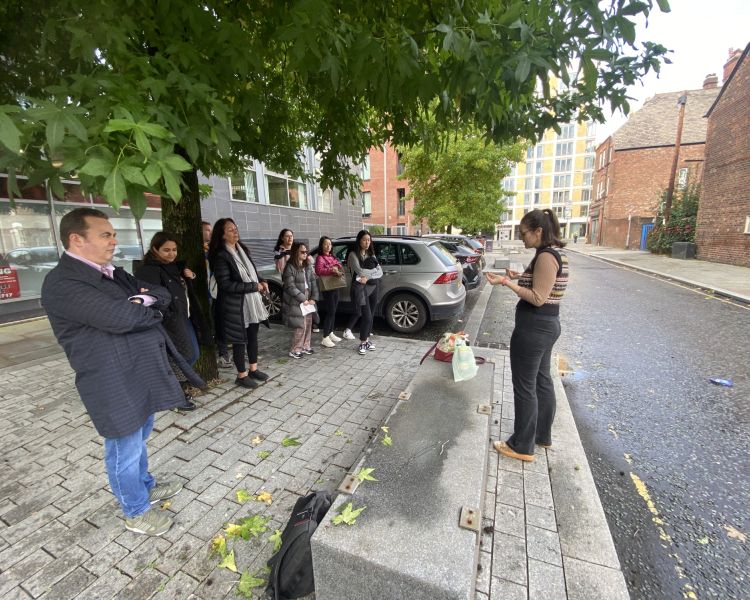 Guide talking to group on manchester food tour