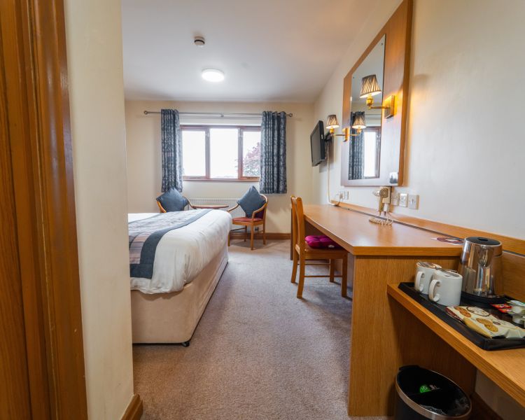 View of double room with furniture at bagden hall