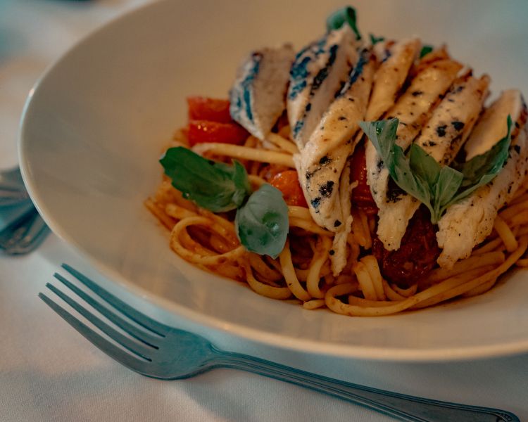 Dish of spaghetti with chicken for dinner at bagden hall