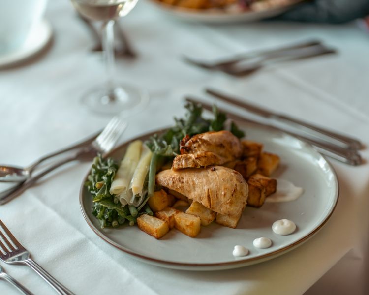 Chicken dish on table at bagden hall restaurant