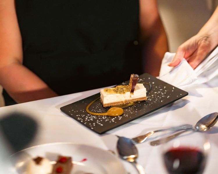 Dessert being served to table at grinkle park