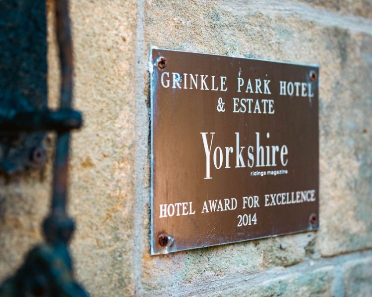Grinkle park hotel sign on wall
