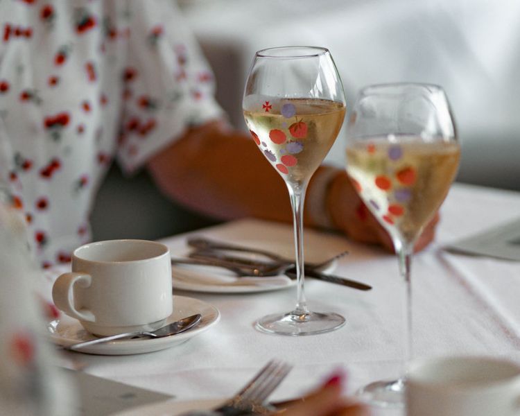 Two glasses of champagne on table at afternoon tea at grinkle park