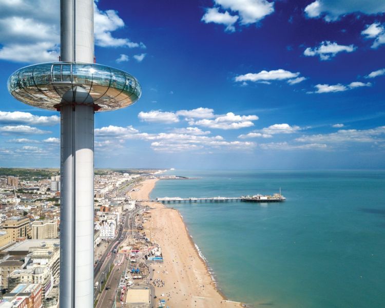 drone image of the brighton i360 pod looking east along the coast