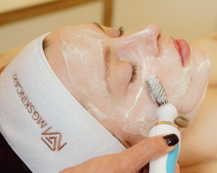 micro current facial being done on womans face