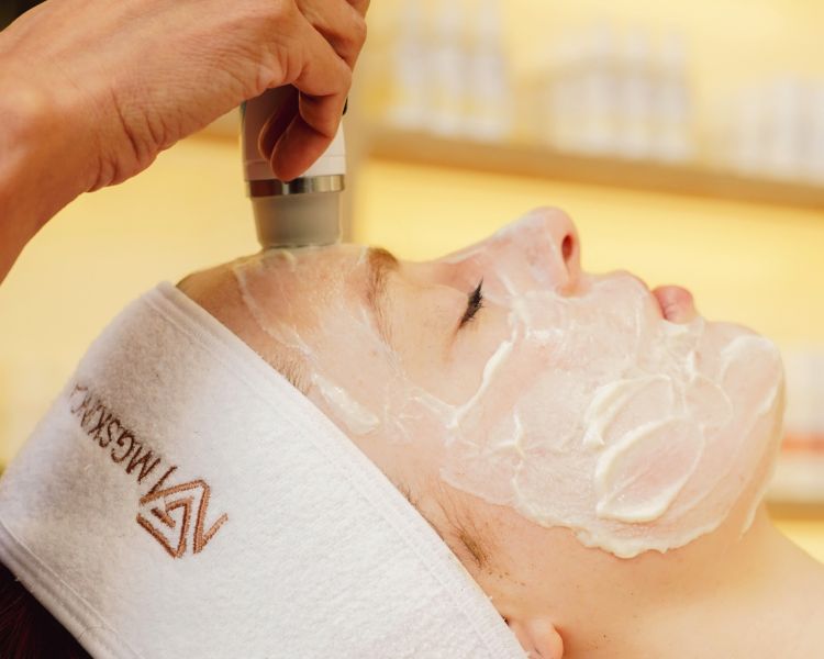 Radio frequency facial being done on womans face