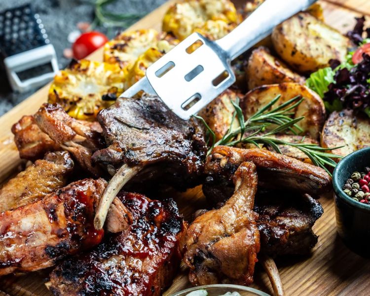Barbecued meat and veg done on a beginners bbq class