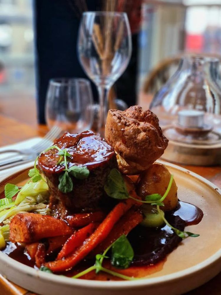 Sunday roast and glasses close up