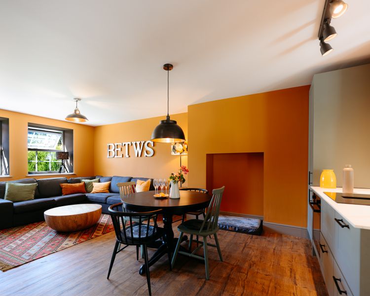 Living room and kitchen area at cottage