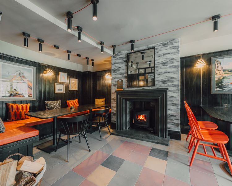 Inn restaurant area with open fire