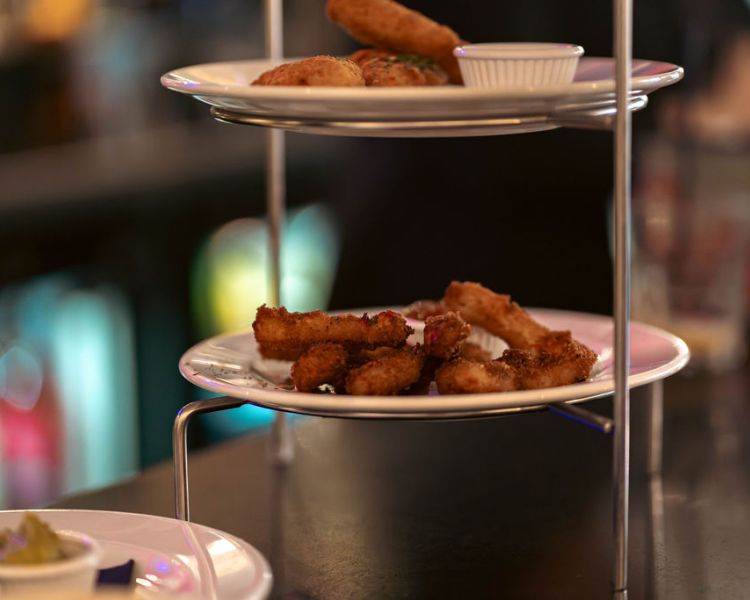 Dishes on tapas tower at white swan hotel